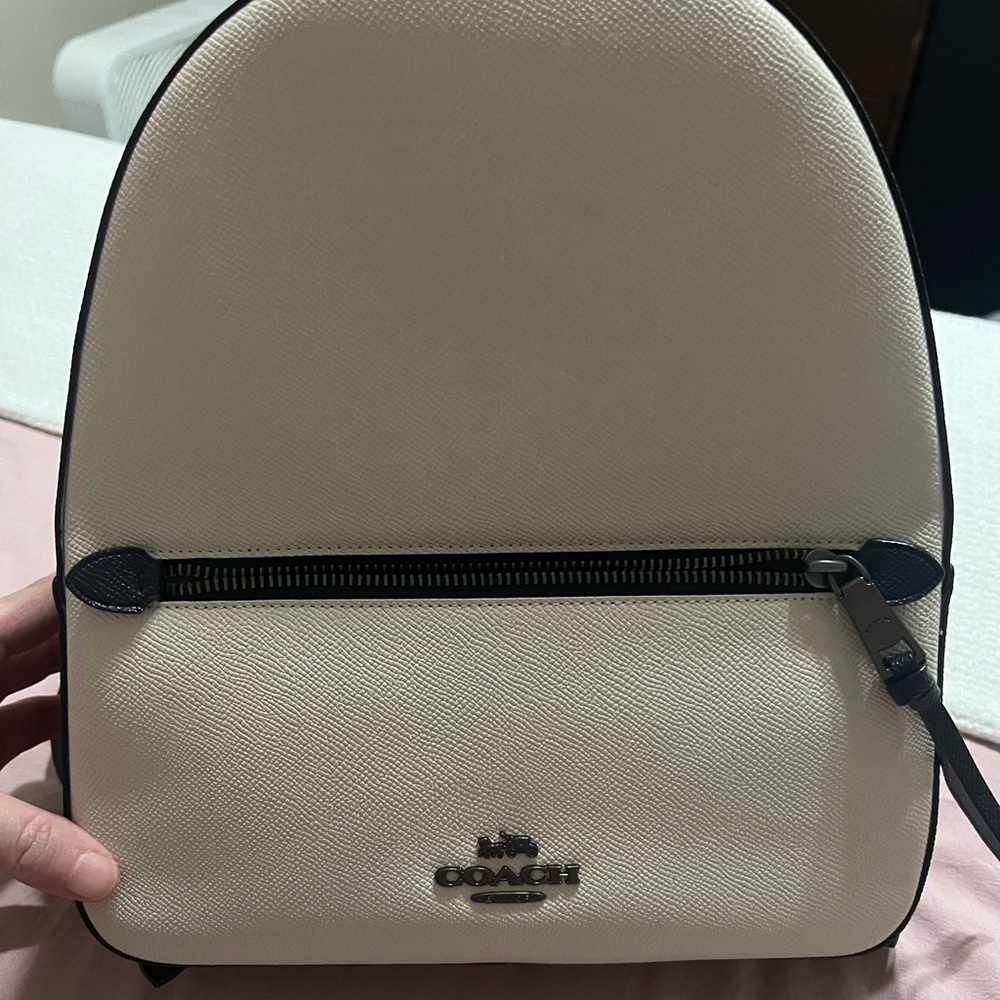 Two-toned white/pink Coach backpack